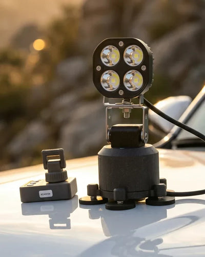 TRACKR360 Nightwatch S3X and Nightwatch L140 magnet-mounted on a vehicle bonnet at last light